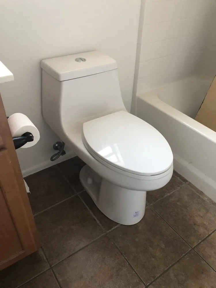 Clean one-piece toilet installed by Lawson Family Plumbing